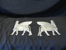 Listing image for Lamassu Winged Assyrian Bull Cast Metal Opposing Wall Sculptures