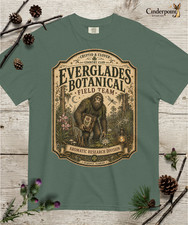 Listing image for Skunk Ape Bigfoot Premium Comfort T-Shirt Everglades Cryptid Folklore Tee S-4XL